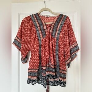 Red bohemian style top with floral print